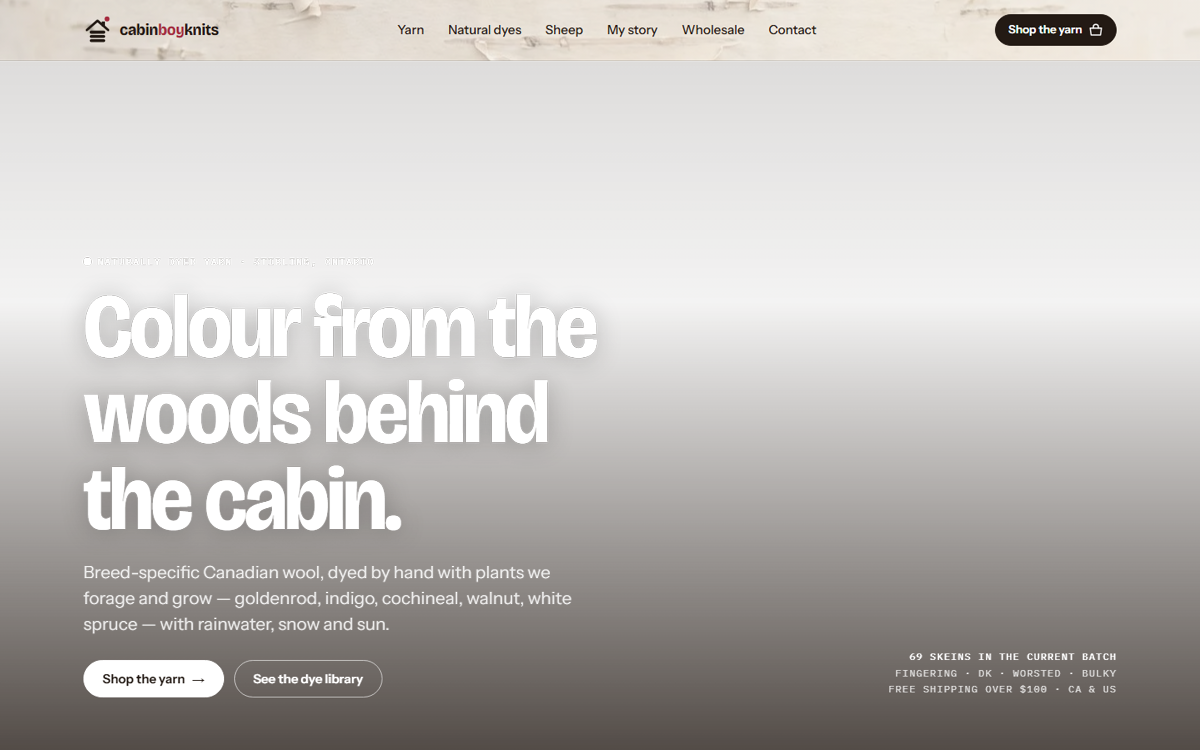 Cabin Boy Knits navigation and hero headline, Colour from the woods behind the cabin, over the film